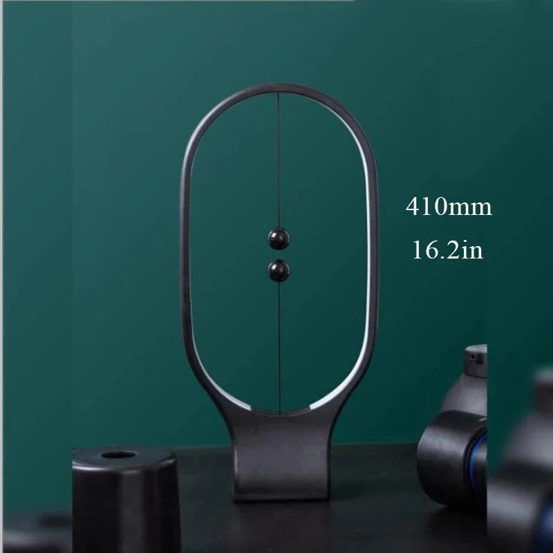 ALDO Home & Garden>Lamps> Lighting & Ceiling Fans 16.2 x 7.7 x 21.7 Inches / New Black / ABS Unique Magnetic Design Clock Tabletop LED Lamp With Base