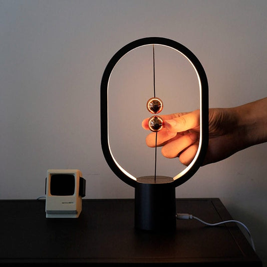 ALDO Home & Garden>Lamps> Lighting & Ceiling Fans 40 * 22* cm / New Black / Metal and Wood Unique Magnetic Design Clock Sculpture Tabletop LED Lamp With Round Base
