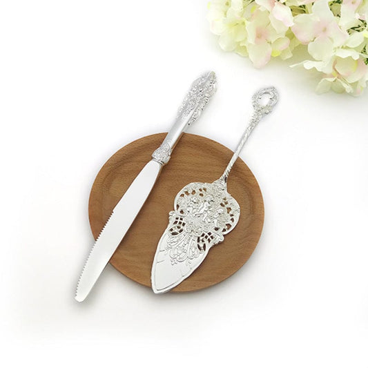 ALDO Party & Celebration > Party Supplies > Party Favors > Wedding Favors New / Stainless steel / Cake Knife cutter: 9.25 inch/ 23.5 cm Cake shovel: 8 inch/ 20.5 cm Beutiful Laxury Bride and Groom British Court Silver-Plated Cake Knife and Cake Shovel Set