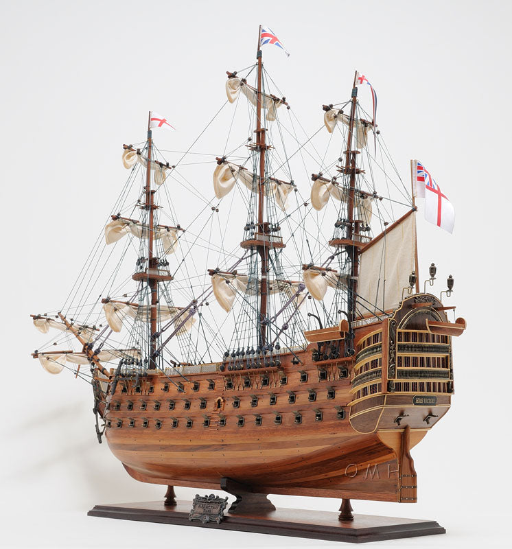 ALDO Hobbies & Creative Arts> Collectibles> Scale Model L: 40 W: 13.75 H: 69 Inches / Brown / Wood HMS Victory Admiral Nelson Flagship Tall Ship Large Sailboat Exclusive Edition Wood Model Assembled With Table Top Display Case